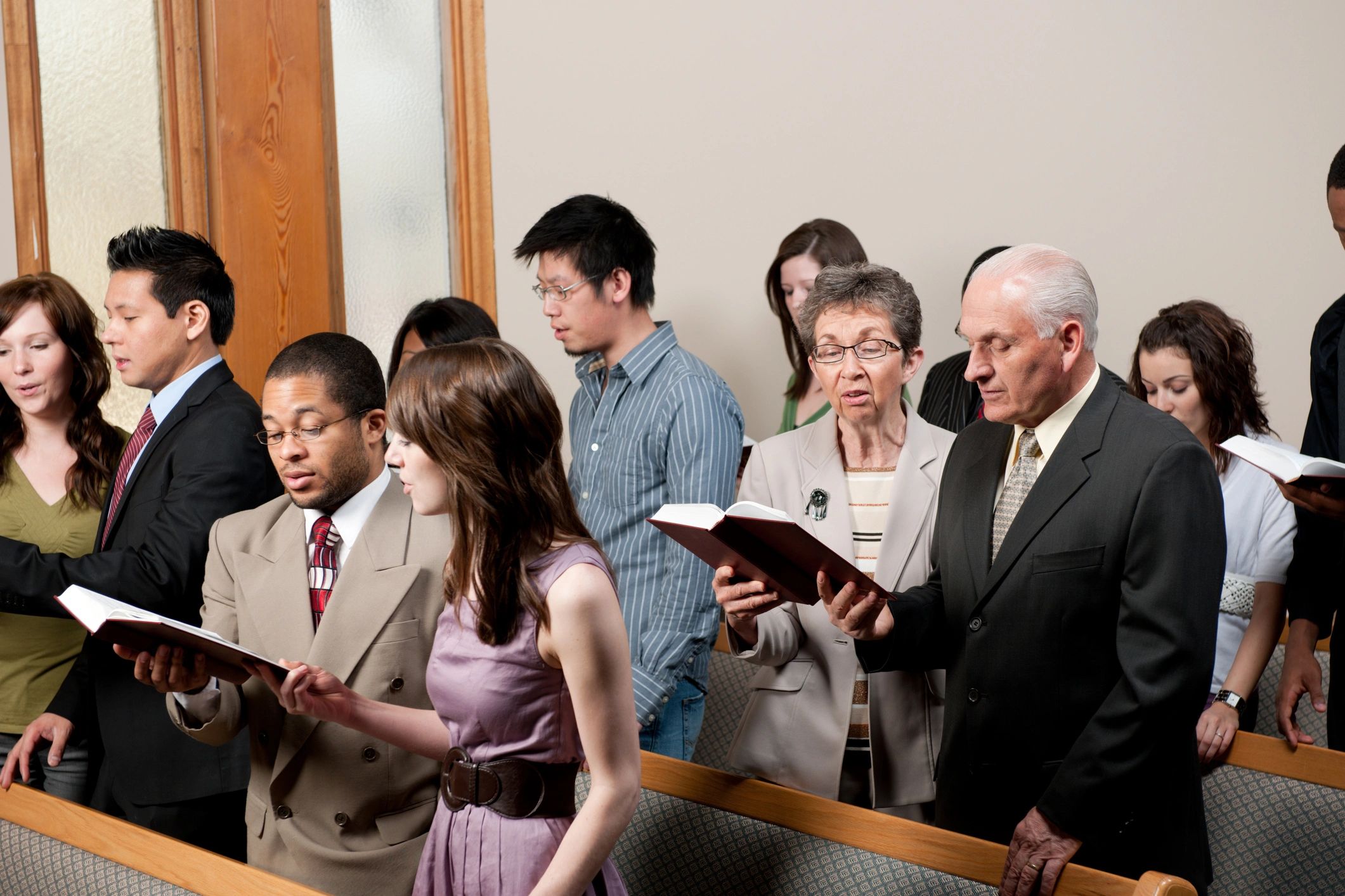 Diverse congregation worshipping together