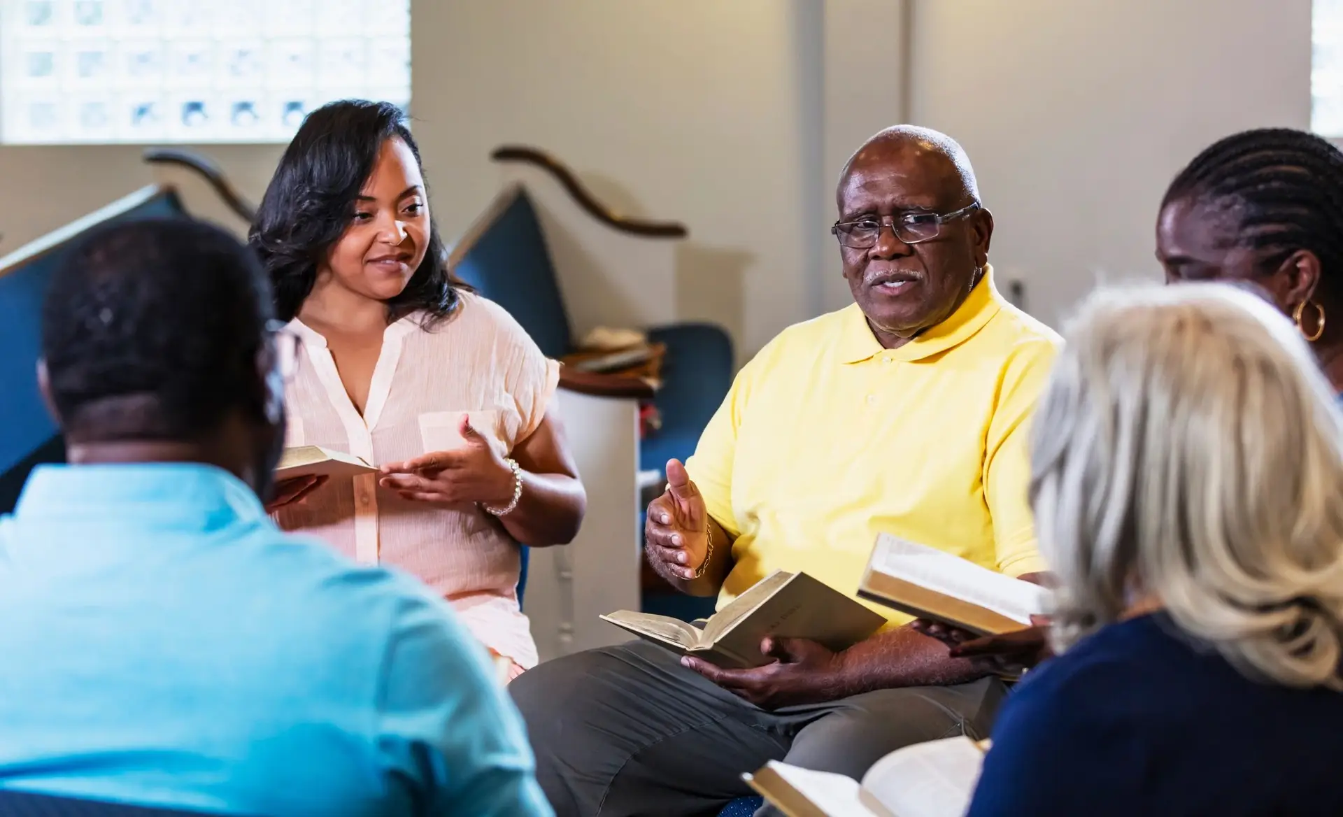 Small group Bible study discussion in a circle